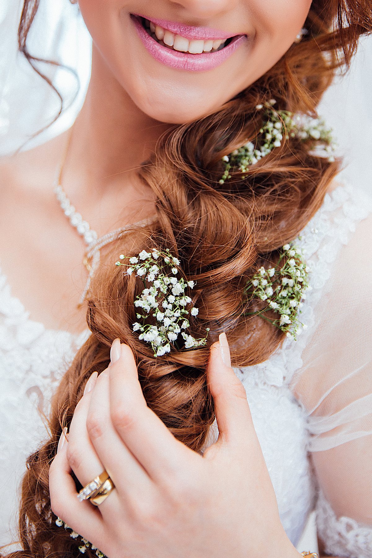 Baby's breath pinned through a soft side braid