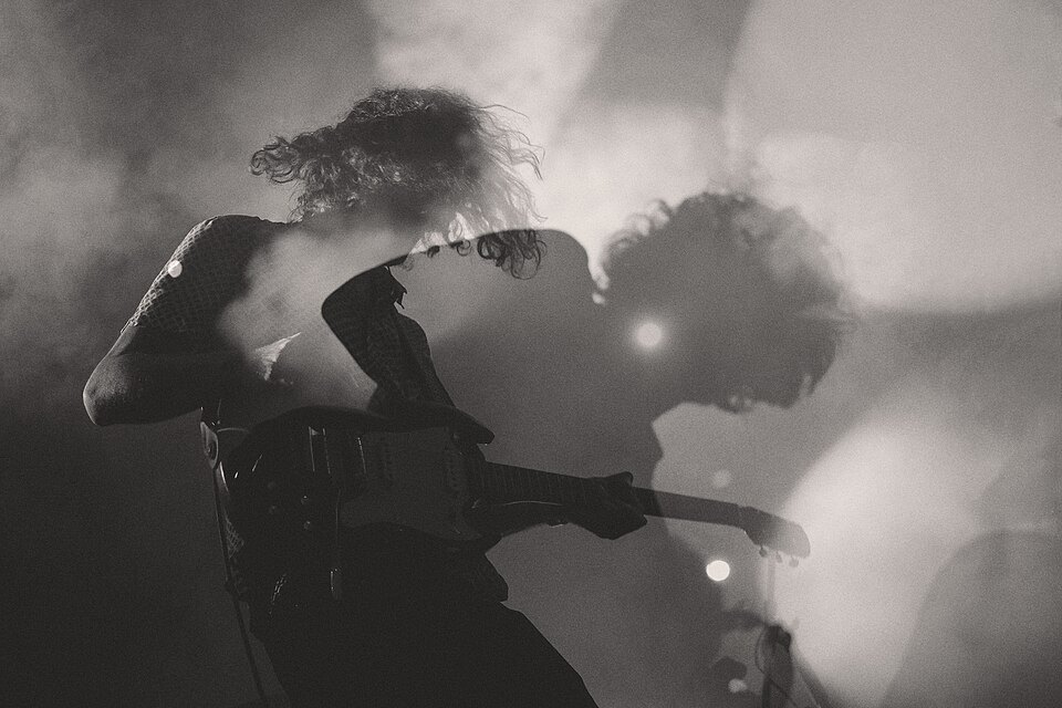 Front row, somewhere in the smoke