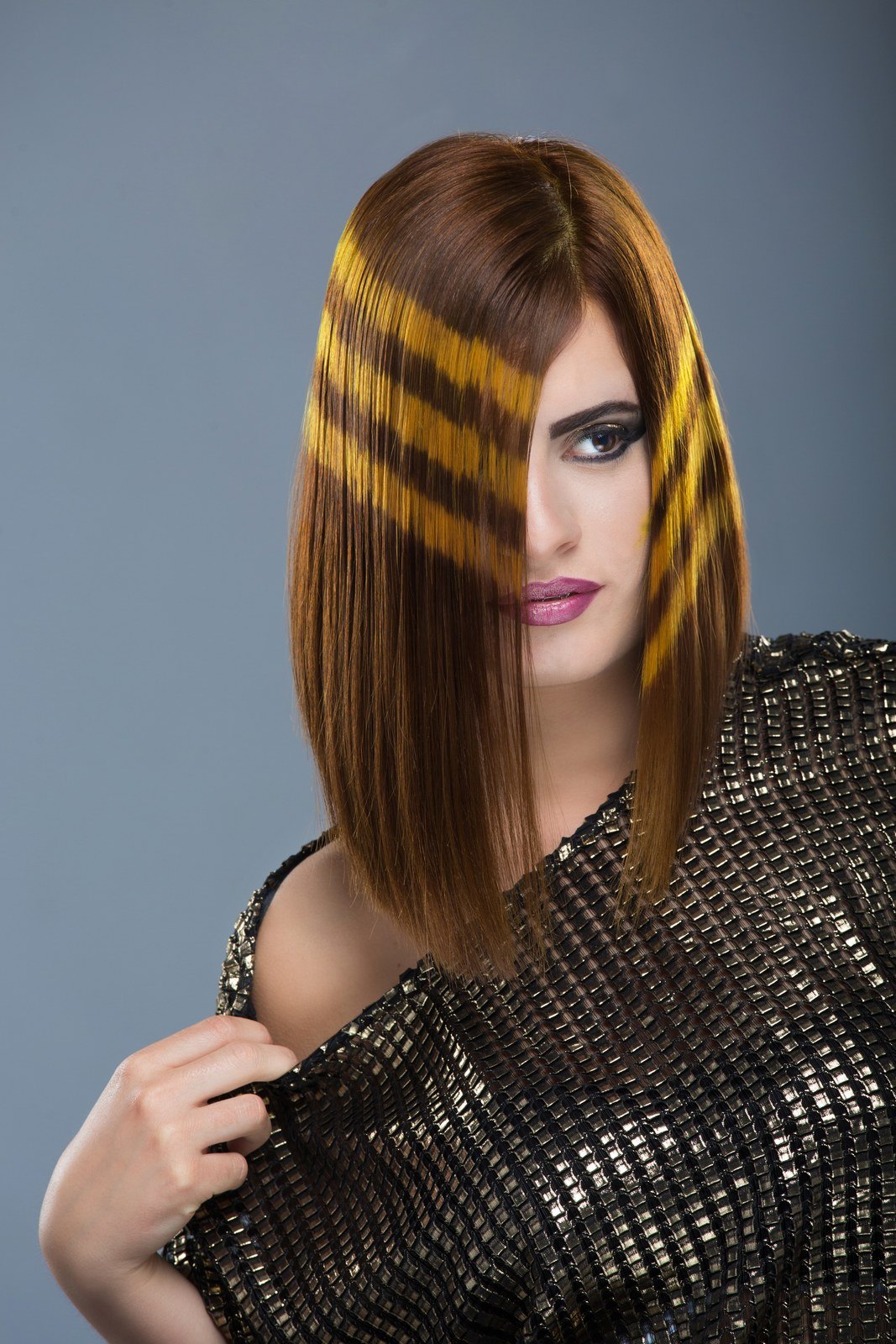 A rose tone built over a pre-lightened base, not a box shade