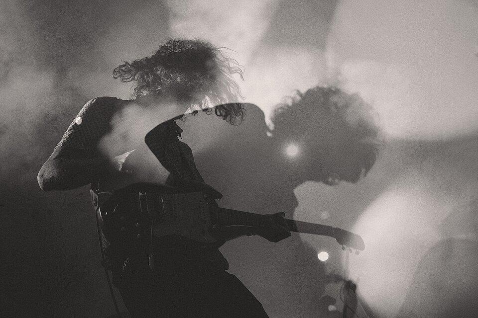 Front row, somewhere in the smoke